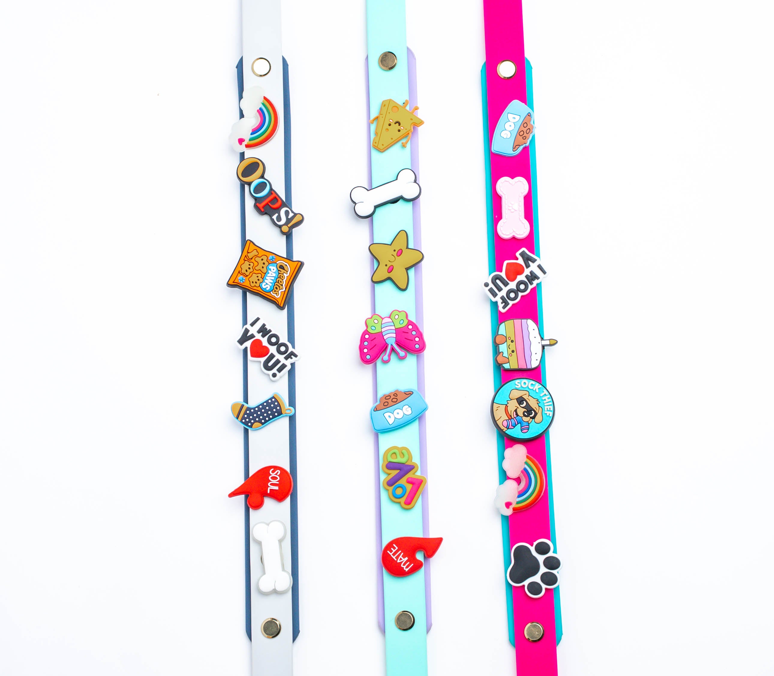Dog leash with fun pins or charms, colorful, soft silicone or pvc material, waterproof, washable. Walk style for dog. 